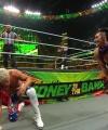 WWE_Money_In_The_Bank_2023_Rhea_Ringside_Attacks_Cody_1564.jpg