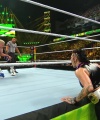 WWE_Money_In_The_Bank_2023_Rhea_Ringside_Attacks_Cody_1656.jpg