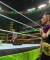 WWE_Money_In_The_Bank_2023_Rhea_Ringside_Attacks_Cody_1677.jpg