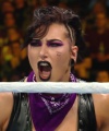 WWE_Money_In_The_Bank_2023_Rhea_Ringside_Attacks_Cody_1682.jpg
