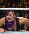 WWE_Money_In_The_Bank_2023_Rhea_Ringside_Attacks_Cody_1728.jpg