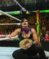 WWE_Money_In_The_Bank_2023_Rhea_Ringside_Attacks_Cody_1848.jpg