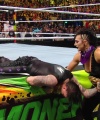 WWE_Money_In_The_Bank_2023_Rhea_Ringside_Attacks_Cody_1900.jpg
