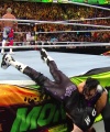 WWE_Money_In_The_Bank_2023_Rhea_Ringside_Attacks_Cody_1904.jpg