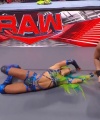 WWE_RAW_4th_April_2022_720p_WEBRip_h264_0719.jpg