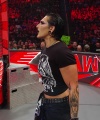 WWE_Raw_05_22_23_Rhea_Ringside_Attacks_Apollo_324.jpg