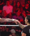 WWE_Raw_05_22_23_Rhea_Ringside_Attacks_Apollo_833.jpg