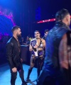 WWE_Raw_05_29_23_Rhea_Ringside_Seth_Puts_Arm_On_Rhea_037.jpg