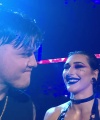 WWE_Raw_05_29_23_Rhea_Ringside_Seth_Puts_Arm_On_Rhea_079.jpg