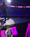WWE_Raw_05_29_23_Rhea_Ringside_Seth_Puts_Arm_On_Rhea_089.jpg