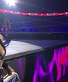 WWE_Raw_05_29_23_Rhea_Ringside_Seth_Puts_Arm_On_Rhea_093.jpg