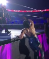 WWE_Raw_05_29_23_Rhea_Ringside_Seth_Puts_Arm_On_Rhea_098.jpg