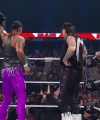 WWE_Raw_05_29_23_Rhea_Ringside_Seth_Puts_Arm_On_Rhea_217.jpg