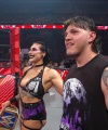 WWE_Raw_05_29_23_Rhea_Ringside_Seth_Puts_Arm_On_Rhea_230.jpg