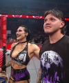 WWE_Raw_05_29_23_Rhea_Ringside_Seth_Puts_Arm_On_Rhea_231.jpg