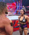 WWE_Raw_05_29_23_Rhea_Ringside_Seth_Puts_Arm_On_Rhea_279.jpg
