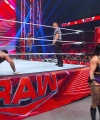 WWE_Raw_05_29_23_Rhea_Ringside_Seth_Puts_Arm_On_Rhea_301.jpg