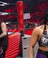 WWE_Raw_05_29_23_Rhea_Ringside_Seth_Puts_Arm_On_Rhea_318.jpg