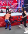 WWE_Raw_05_29_23_Rhea_Ringside_Seth_Puts_Arm_On_Rhea_337.jpg