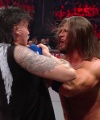 WWE_Raw_05_29_23_Rhea_Ringside_Seth_Puts_Arm_On_Rhea_347.jpg