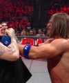 WWE_Raw_05_29_23_Rhea_Ringside_Seth_Puts_Arm_On_Rhea_348.jpg