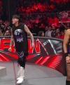 WWE_Raw_05_29_23_Rhea_Ringside_Seth_Puts_Arm_On_Rhea_397.jpg