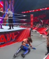 WWE_Raw_05_29_23_Rhea_Ringside_Seth_Puts_Arm_On_Rhea_400.jpg