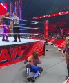 WWE_Raw_05_29_23_Rhea_Ringside_Seth_Puts_Arm_On_Rhea_401.jpg