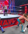 WWE_Raw_05_29_23_Rhea_Ringside_Seth_Puts_Arm_On_Rhea_431.jpg