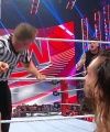 WWE_Raw_05_29_23_Rhea_Ringside_Seth_Puts_Arm_On_Rhea_456.jpg