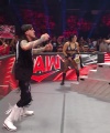 WWE_Raw_05_29_23_Rhea_Ringside_Seth_Puts_Arm_On_Rhea_483.jpg