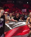 WWE_Raw_05_29_23_Rhea_Ringside_Seth_Puts_Arm_On_Rhea_495.jpg