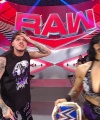 WWE_Raw_05_29_23_Rhea_Ringside_Seth_Puts_Arm_On_Rhea_507.jpg