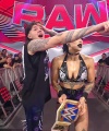 WWE_Raw_05_29_23_Rhea_Ringside_Seth_Puts_Arm_On_Rhea_513.jpg