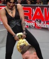 WWE_Raw_12_18_23_Ivy_Rhea_Ringside_Ivy_Attacks_Rhea_0600.jpg